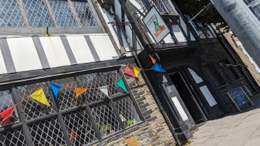 Bunting hangs from the cafe at Glyndwr's Parliament House.