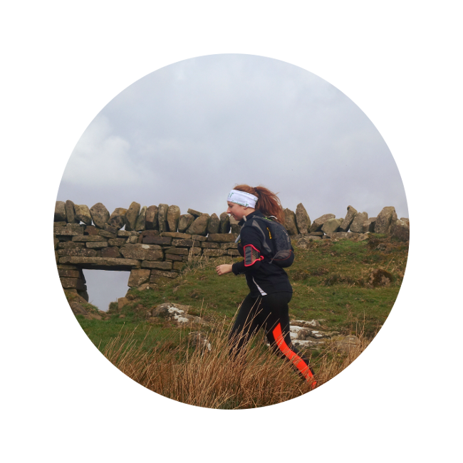 A runner on Hadrian's Wall Path with corporate discount